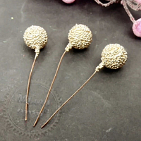 Ball with powder 15 mm on a wire, gold